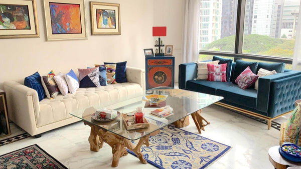 Eclectic living room featuring a custom ivory Duchess sofa alongside a blue Fitzgerald sofa.