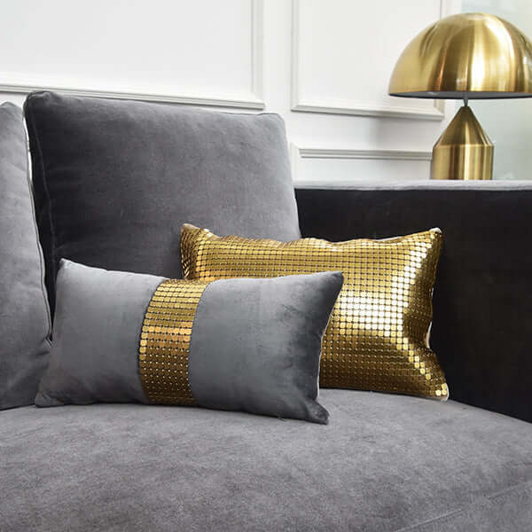 Dampierre Boudoir collection on grey velvet sofa.