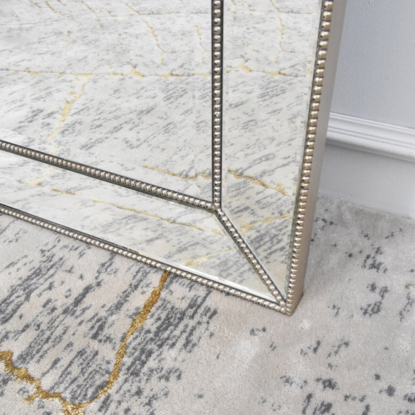 Vintage Mirror Detailing in mixed champagne distressed hues.