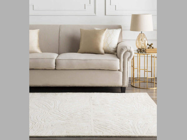 Create a brighter look with the Labyrinth Ivory Rug in your living space against neutral brown tones.