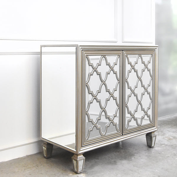 Side view of mirrored cabinet with hand painted champagne-gold frame. 