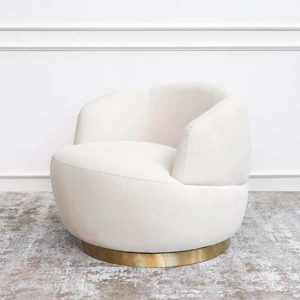 Curved and comfortable velvet upholstery, with stainless steel gold base plinth.