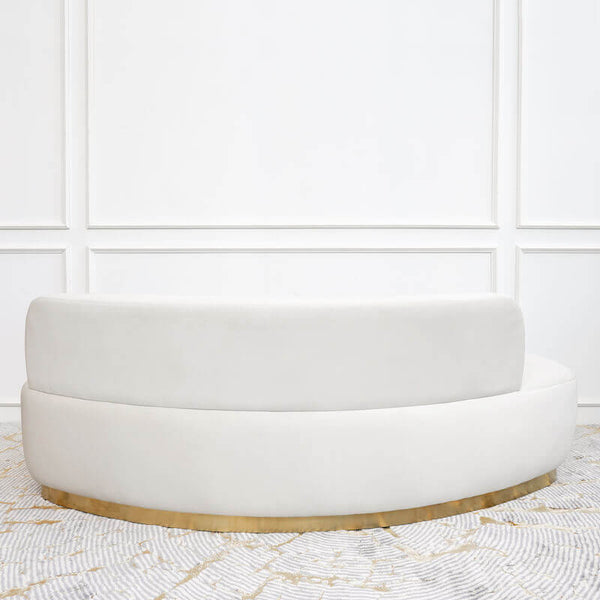 Curved back view of the Infiniti sofa, sleek and modern sofa style with stainless steel gold base.