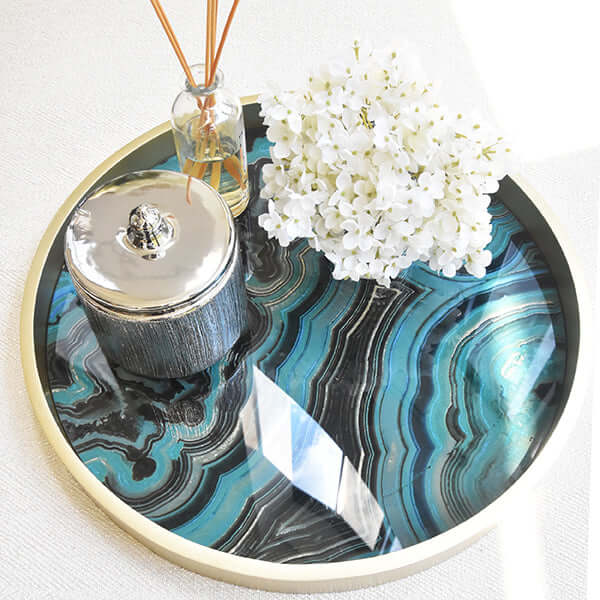 Add a pop of colour to your home with cream Grandiflora Hydrangea faux flower and a bold marbled tray.