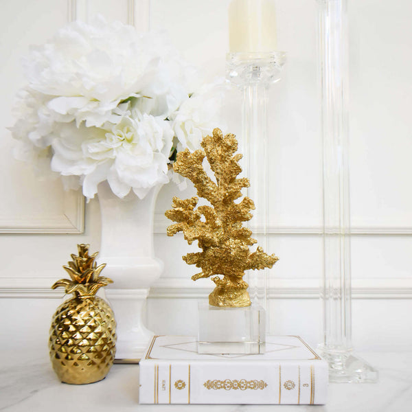 White and gold decor with snow peonies inside vase.