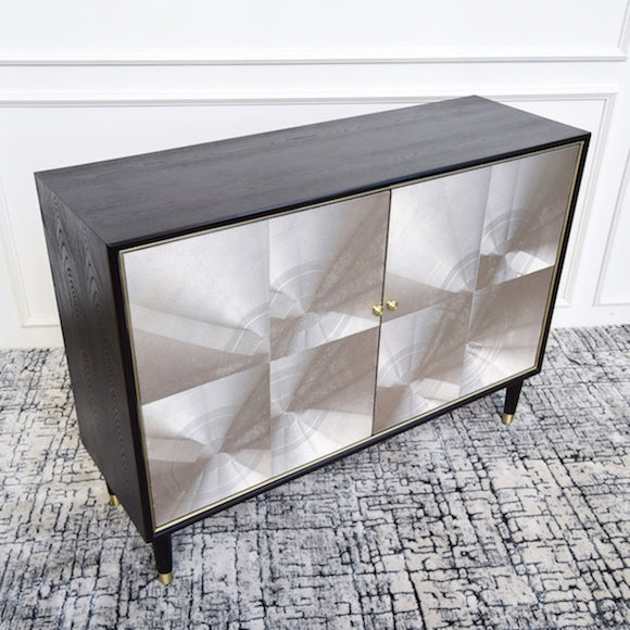 Strong bold table top in elm veneer with contrasting metallic door panels. 