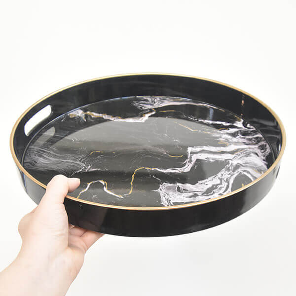 Popular Leto Marbled Round Tray in Black.