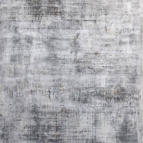 Levine Luxury Silky Rug, Grey Hues, features a textured foundation in light tones with subtle streaks of muted grey hues to give your living space a faded, vintage-inspired look.