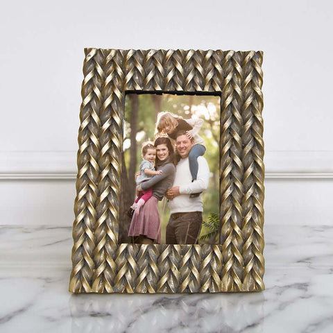 Lewitt, braided chevron twists in a rustic gold finish.