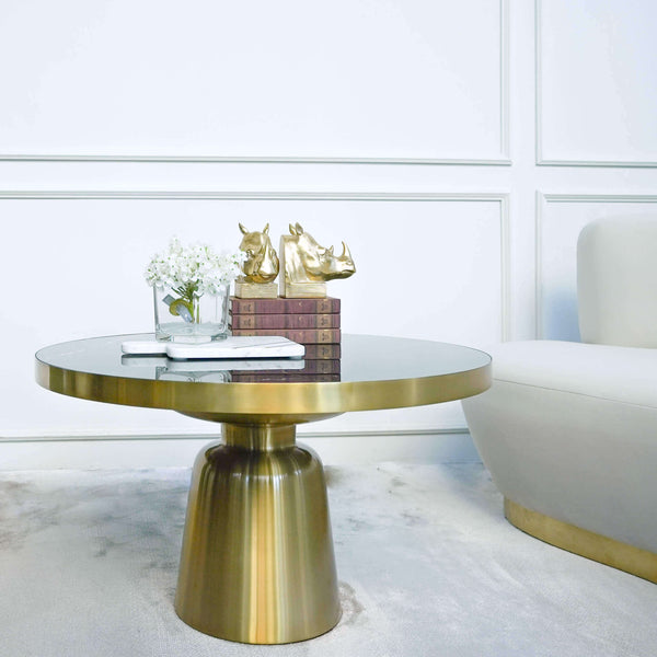 Smooth brushed gold stainless steel on the Louis coffee table frame and legs. Match your table decor with white gold and marbled pieces. 