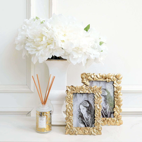 Layer the Love Gold Leaves Sculpture photo frame with the Pachira Gold Leaves Sculpture Photo Frame. Known to bring luck, this lovely collection of photo frame series injects a natural appeal with their breezy and tropical feel. 