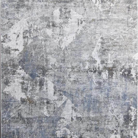 Details of the Marcel abstract art rug, modern yet artistic, this rug features hues of grey and hints of blue for a cool themed room..