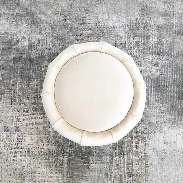 Top view of Ivory Round Pouf Stool, Silhouette shaped for a modern vintage look.