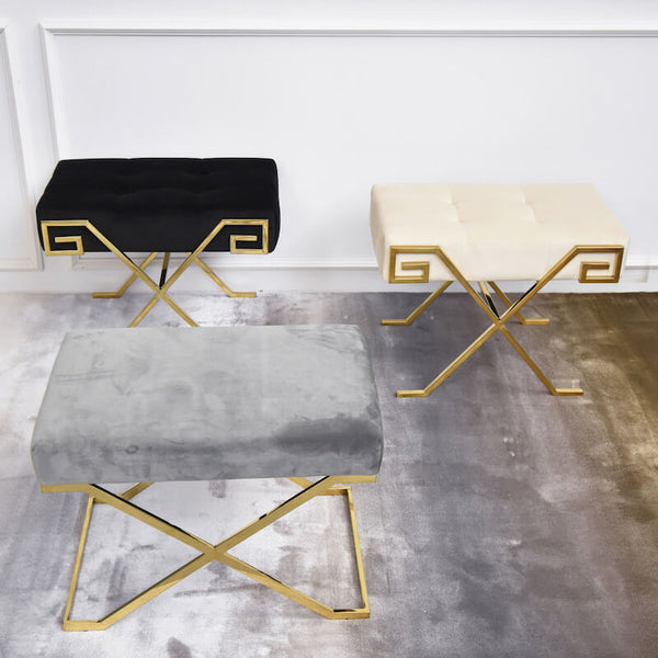 Stools and bench with Slim and Polished cross gold legs. Available in Black and Ivory.