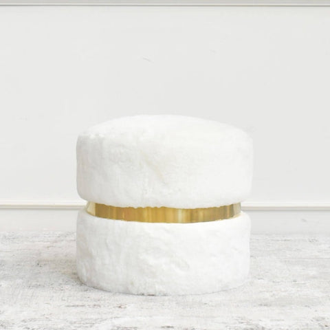 A classic timeless stool that magnifies innocence and beauty in white and stainless steel gold.