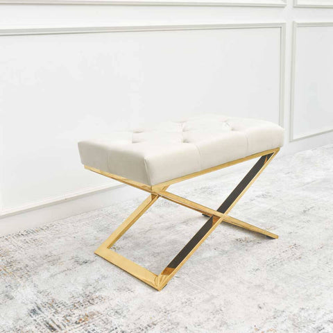 Inspired by the modern luxury interiors, this Mon Jervois Cross Ottoman Stool is a must-have of-the-moment look. Its gold legs extend up onto the cushion for a glamorous touch of tufted design in lush velvet, delicately introducing instant style to any residential development.