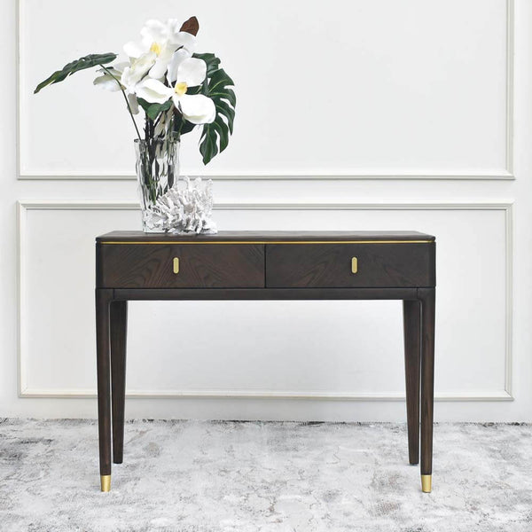 Table styled with decor: The Odette Console Vanity Table adorned with decorative items and personal touches, illustrating its versatility as a stylish dressing table or console.