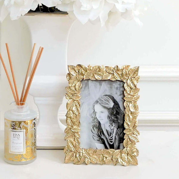 Pachira Gold Leaves Photo Frame in Living Room Deco Ideas  .