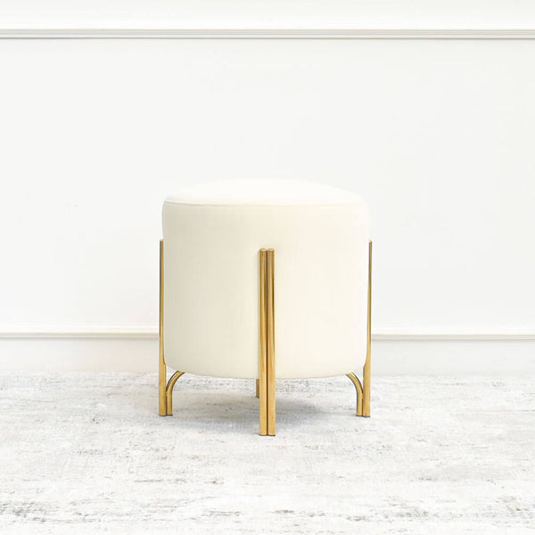 Park Nova Ottoman is an all-purpose gold stool. Upholstered in ivory cream, its silm legs are made from high quality gold plated stainless steel.