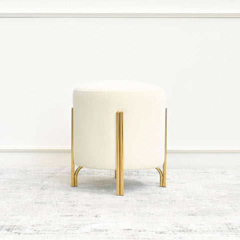 Park Nova Ottoman is an all-purpose gold stool. Upholstered in ivory cream, its silm legs are made from high quality gold plated stainless steel.