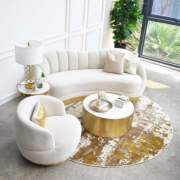 Complete your living room look with a modern mid century combination of furniture. The Primrose sofa pairs well with the Infiniti curved armchair and the Marc Coffee table. The round Emilien rug completes the modern lux look.