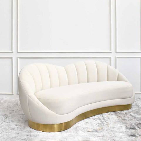 Side view of the Primrose curved sofa, features sleek lines and a comfortable firm, multi density foam filled seatings.