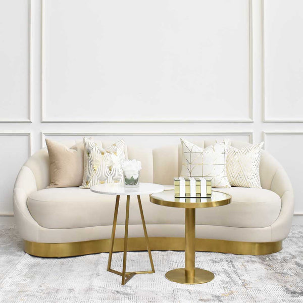 Style your living room up with a dash of sophisticated glamour with the Primrose Curved sofa set. Stack the Aleta and Vis-a-vis side tables to create a nesting coffee table look.