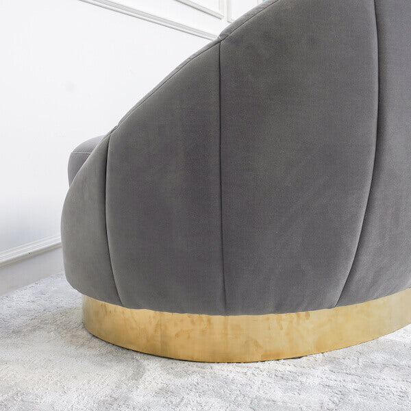 Close up view of the grey Primrose sofa, rounded lines creating a crescent arch on the edges for a smooth look.