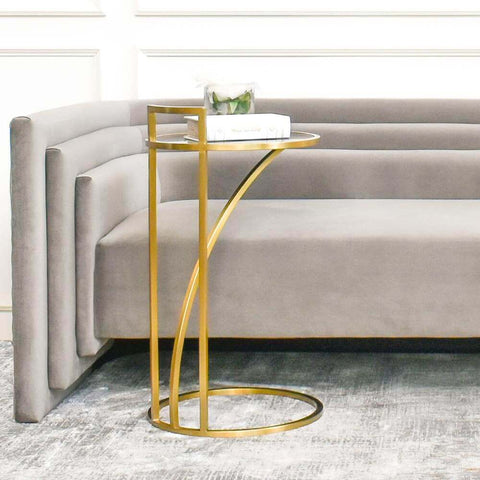 Made with clear glass table top, Pruie C-Shaped Gold End Table is designed with space visual and allows you to slide it under your sofa, and comfortably place your laptop or tea cup in front of you without sacrificing leg room.