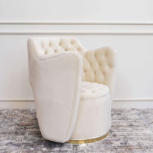 Raphael swivel armchair, modern mid century design, hand tufted details on the seat and the backrest.
