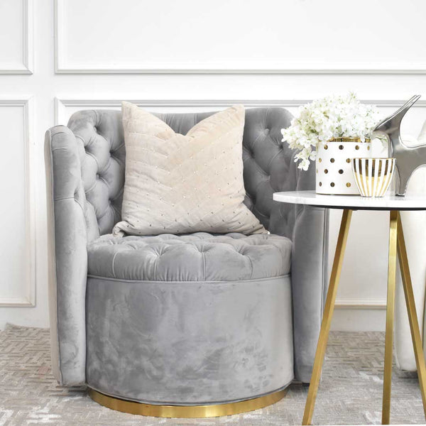 For a neutral themed look, the Paige beige cushion is the perfect fit against the Grey velvet armchair.
