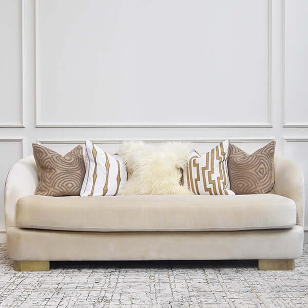 Customisable Rever sofa shown in performance fabric, styled with free matching cushions.