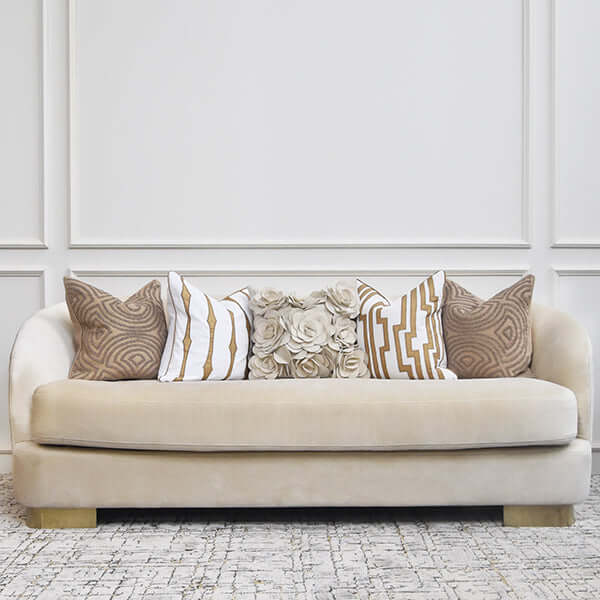 Front view of the Rever 3-Seater-Plus Sofa with plush back cushions, smooth performance fabric, and elegantly curved arms.