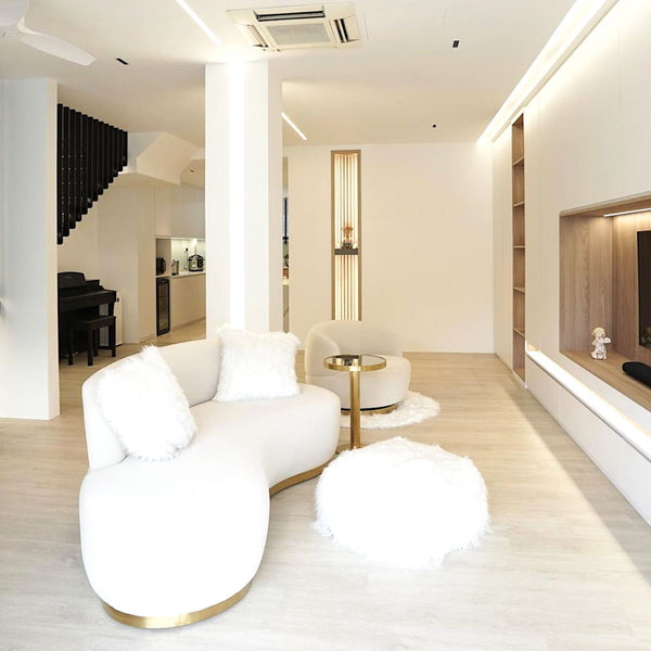 Discover affordable luxury with the Infiniti Curved Sofa. This stylish and comfortable white ivory couch is the perfect centerpiece for a modern living room in a landed home property in Singapore.