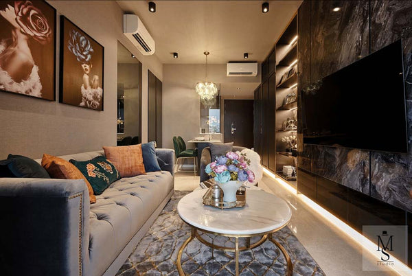 Achieve a high-end designer look with our affordable Earl Chesterfield Sofa. This elegant, tufted grey sofa is featured in a glamorous luxury condo project by the renowned Mr Shopper Studio.