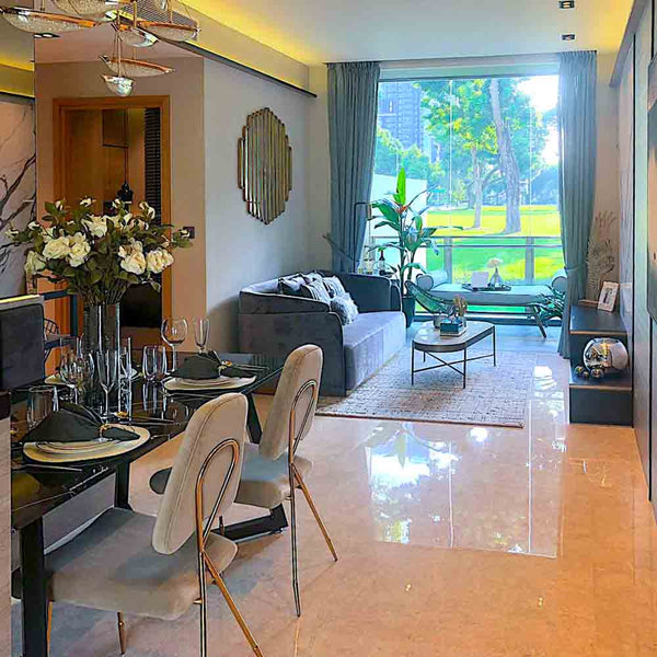 The stylish dark grey Zelda Sofa provides comfortable, affordable luxury in the modern living room of the Jervois Treasures condo showflat in Singapore.