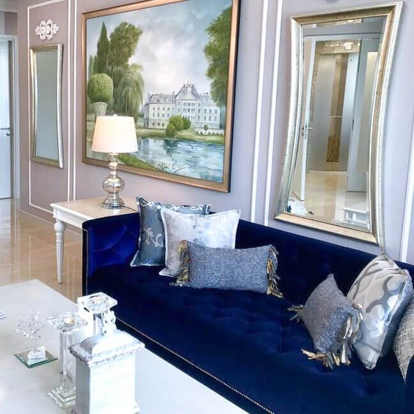 Deep purple Earl sofa set in a Victorian-style interior, surrounded by ornate decor and rich finishes.