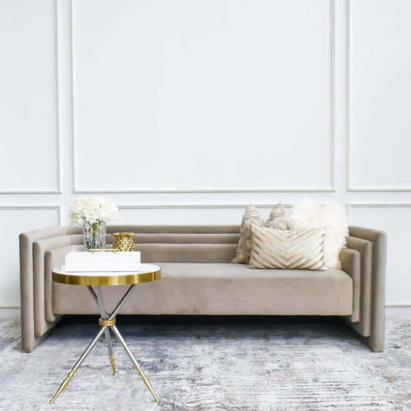 Neutral theme living room with Cristian White marble gold side table and Light bronze velvet sofa.