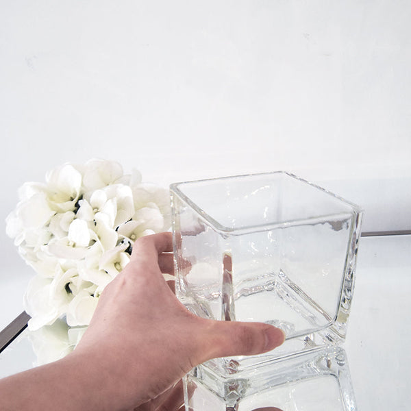 Square Ritz glass vases.