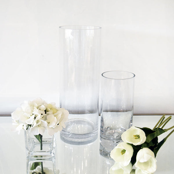 Beautiful deocrative glass vases that are commonly used for modern home and office interior designs.