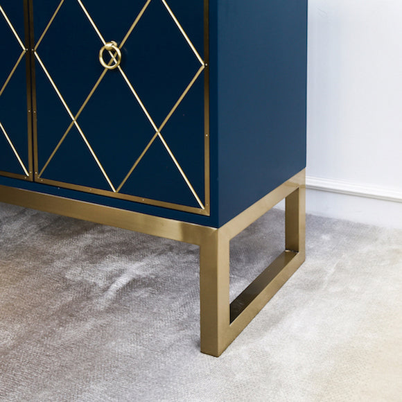 Valentino 3 Door Cabinet Gold Details on legs, rectangular frame.