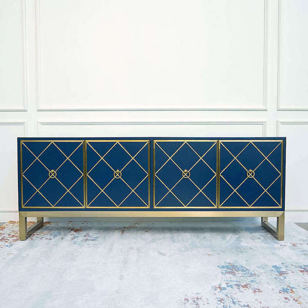 Valentino Blue Gold Sideboard Cabinet on Luxury Rug with Pop of Color in Blue and Gold.