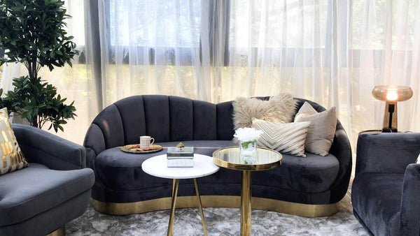Grey, gold and white marble combination for a cool and cosy living room.