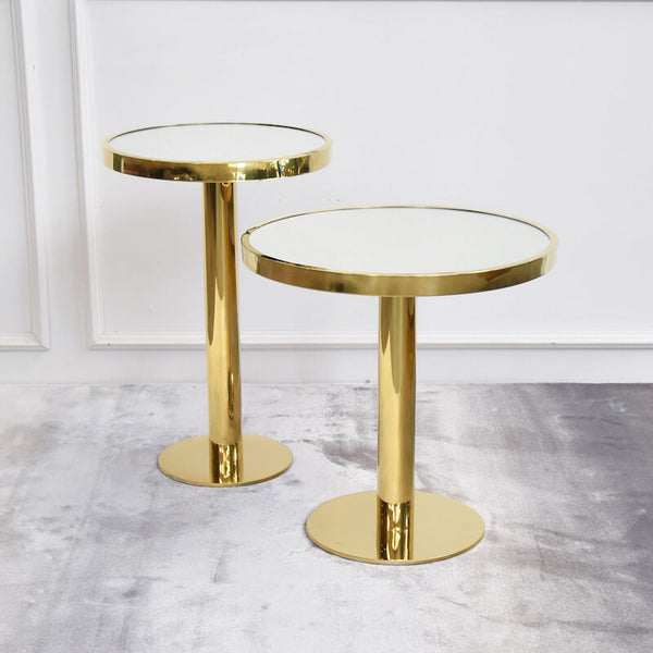 Polished end table, with mirror finish, stack them together to form a nesting coffee table style.
