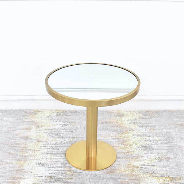 Vis-a-vis Round Coffee Table (grande) with mirrored table top inset table rim using stainless steel plated in brushed gold. Table sits atop a round pedestal and tube gold round base for a vintage yet timeless feel.