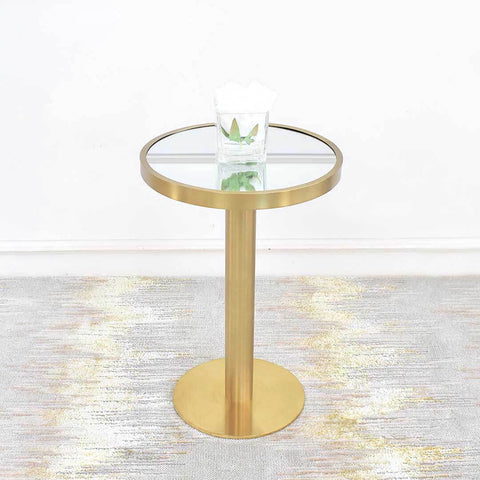 Vis-a-vis Round Small Coffee Table (Tall) is designed with mirrored table top inset stainless steel brushed gold rim. Small round table sits atop a pedestal gold tube with round base in stainless steel for a classy yet timeless home design.