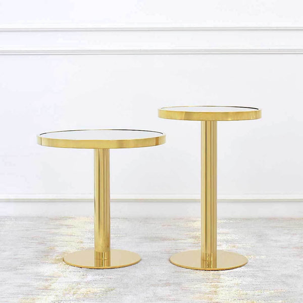 Vis-a-vis Polished Gold Coffee Table and Side Table Collection pair up for a timeless luxury look for a modern home design. On display at Finn Avenue Furniture Showroom.