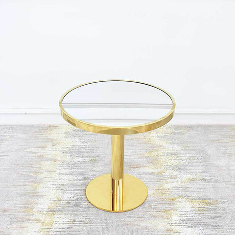 Vis-a-vis Round Coffee Table (grande) with mirrored table top inset stainless steel polished gold rim. Table sits atop a pedestal polished gold round base for a vintage yet timeless feel.