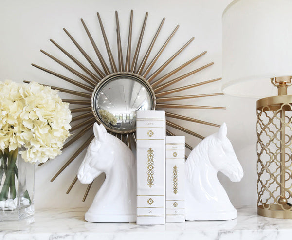 The Creamy hydrangeas complements very well with an ivory and gold themed shelf decors.