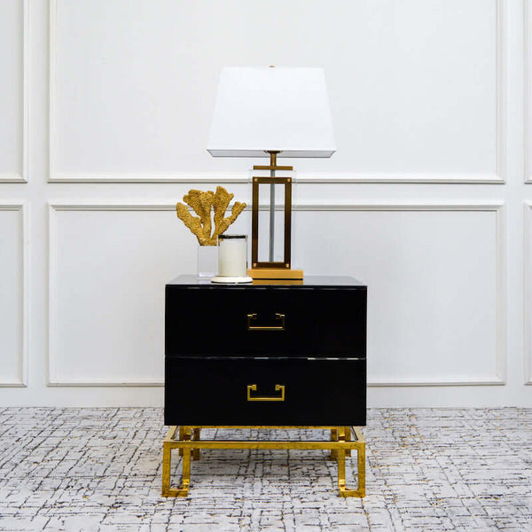 Black glass table top with 2-drawers in gold stainless steel frame.